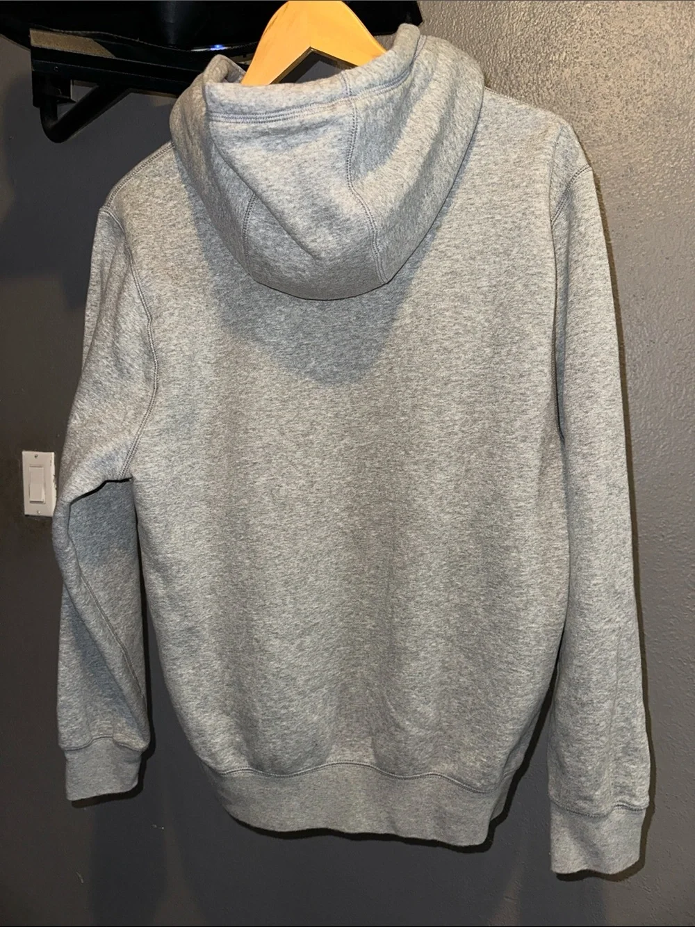 Nike Gray Hoodie with Blue Logo and Orange Swoosh Accent